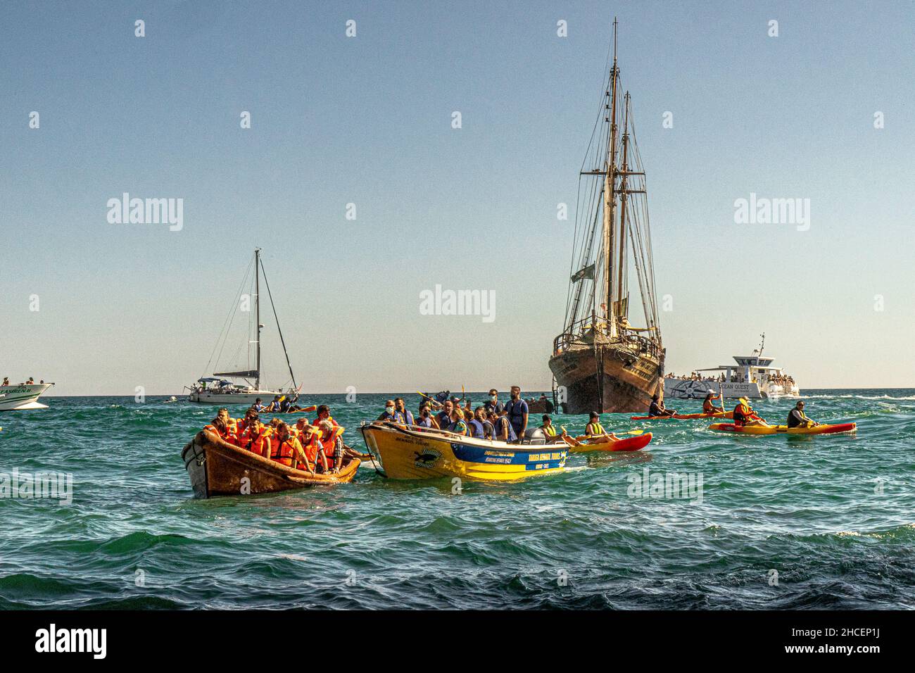 Boats waiting to enter Benagil Cave algarve  Portugal Stock Photo