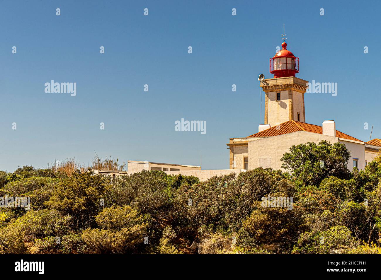 Alfanzina lighthouse Carvoeiro Coastline Portugal Stock Photo