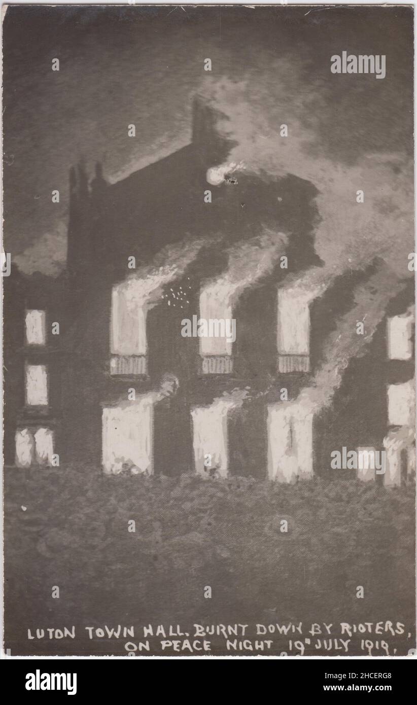Photographic postcard showing Luton Town Hall in flames during the 1919 Peace Day riots. The civic building was set on fire by ex-servicemen unhappy at their post-war treatment Stock Photo
