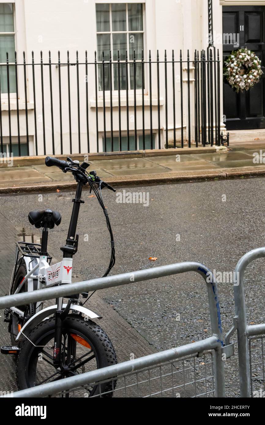 London, UK. 26th Dec, 2021. An electric bike parked outside 11 Downing Street, London UK Credit: Ian Davidson/Alamy Live News Stock Photo