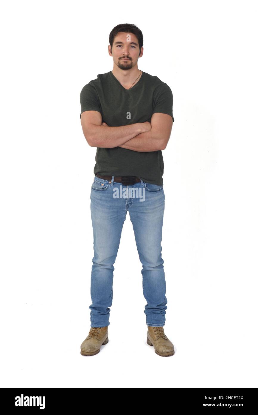 full potrait of a man looking at camera and arms crossed on white ...