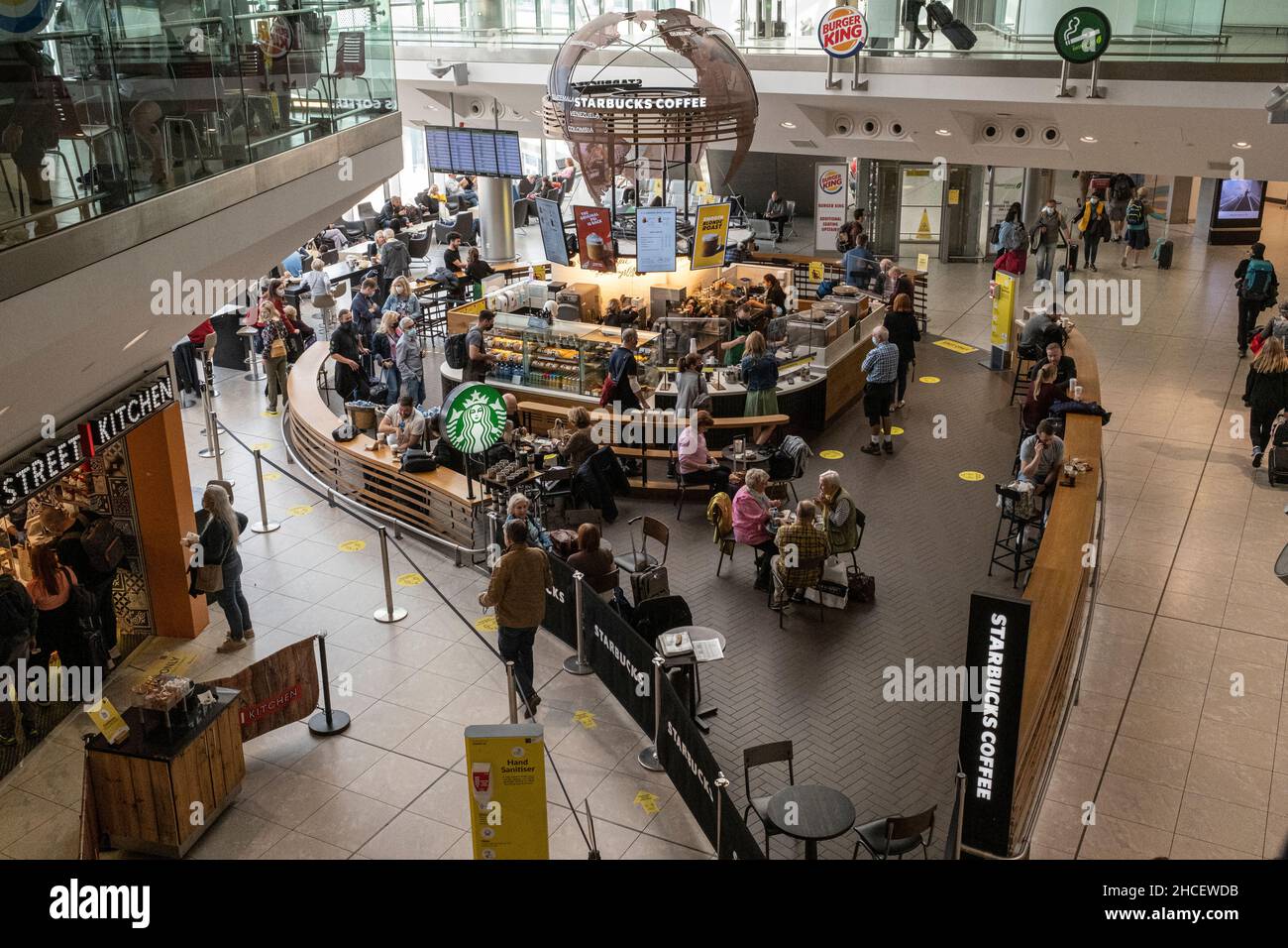 Starbucks coffe shop in the departures lounge with passengers queing to buy drinks and refreshments, Dublin Airport, Dublin, Ireland Stock Photo