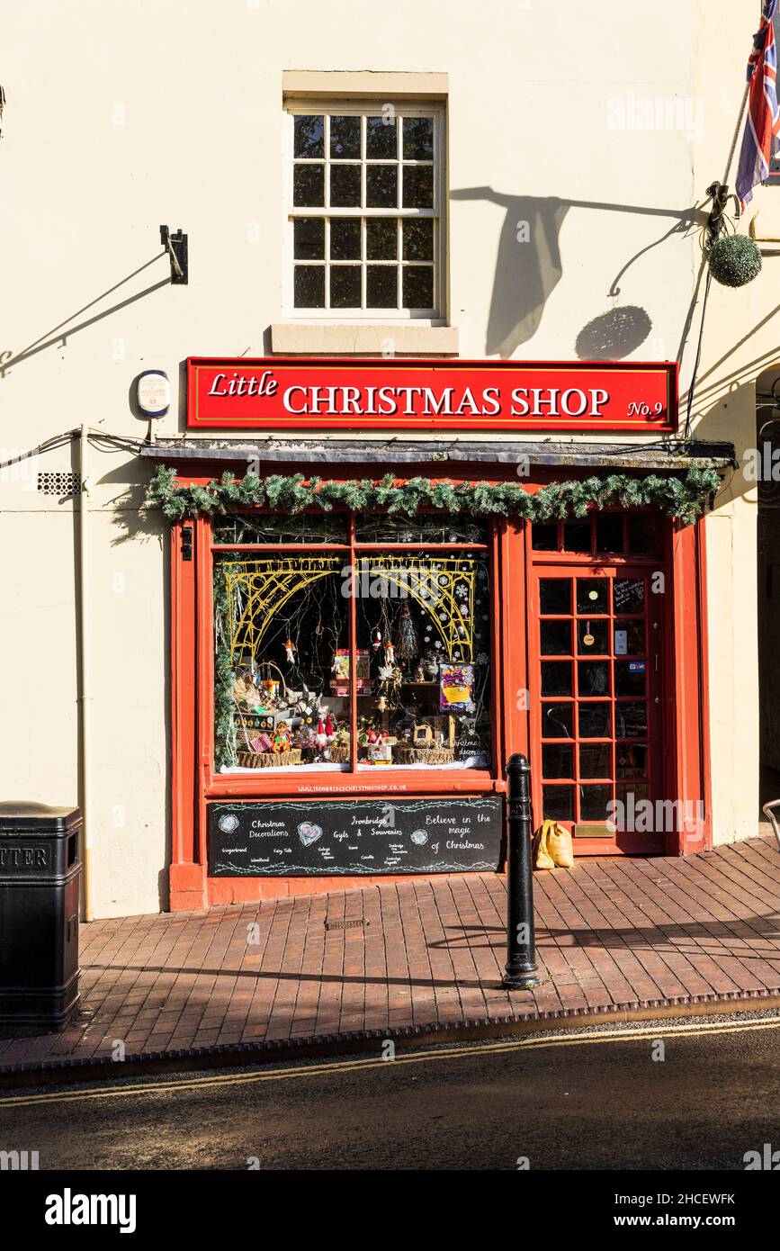 Traditional shopfronts, Little Christmas shop, in the village of Ironbridge, Telford, Shropshire, England Stock Photo