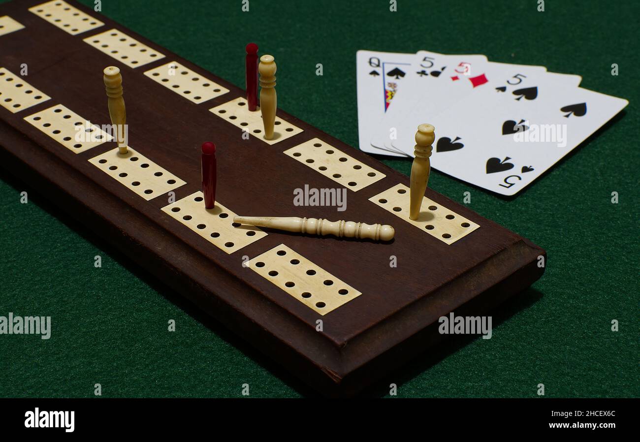 Antique Cribbage board and hand of cards Stock Photo Alamy