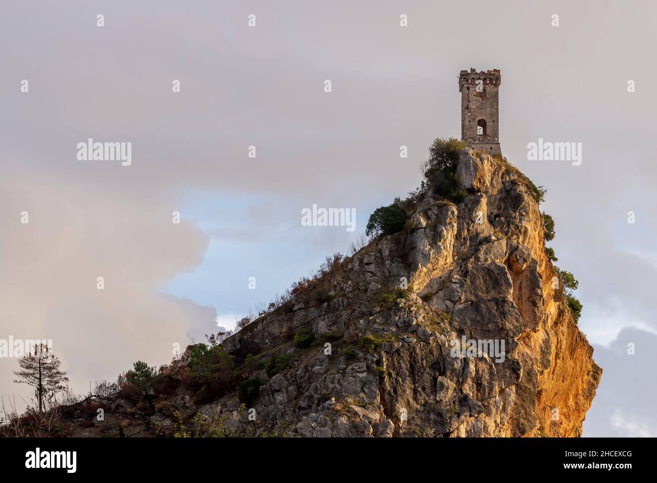 The Upezzinghi tower in Caprona against a dramatic sky, Pisa, Tuscany, Italy Stock Photo