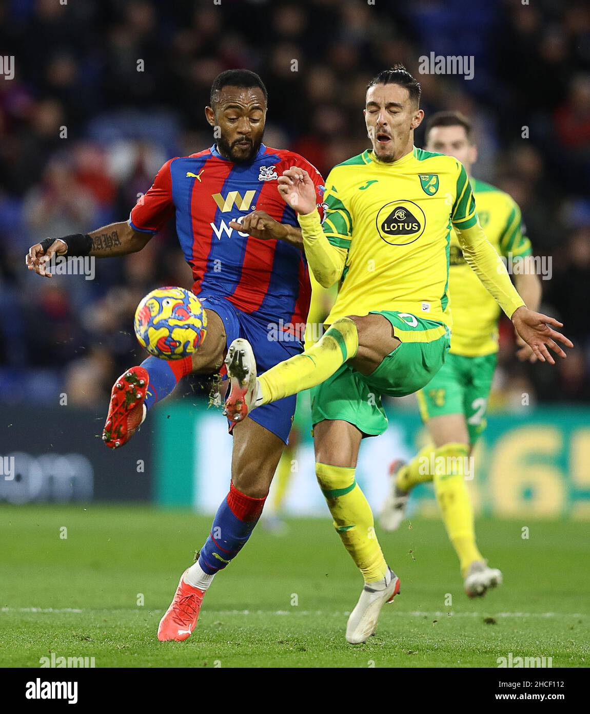 London, England, 21st January 2023. Joel Ward of Crystal Palace and Joe  Willock of Newcastle United challenge for the ball during the Premier  League match at Selhurst Park, London. Picture credit should