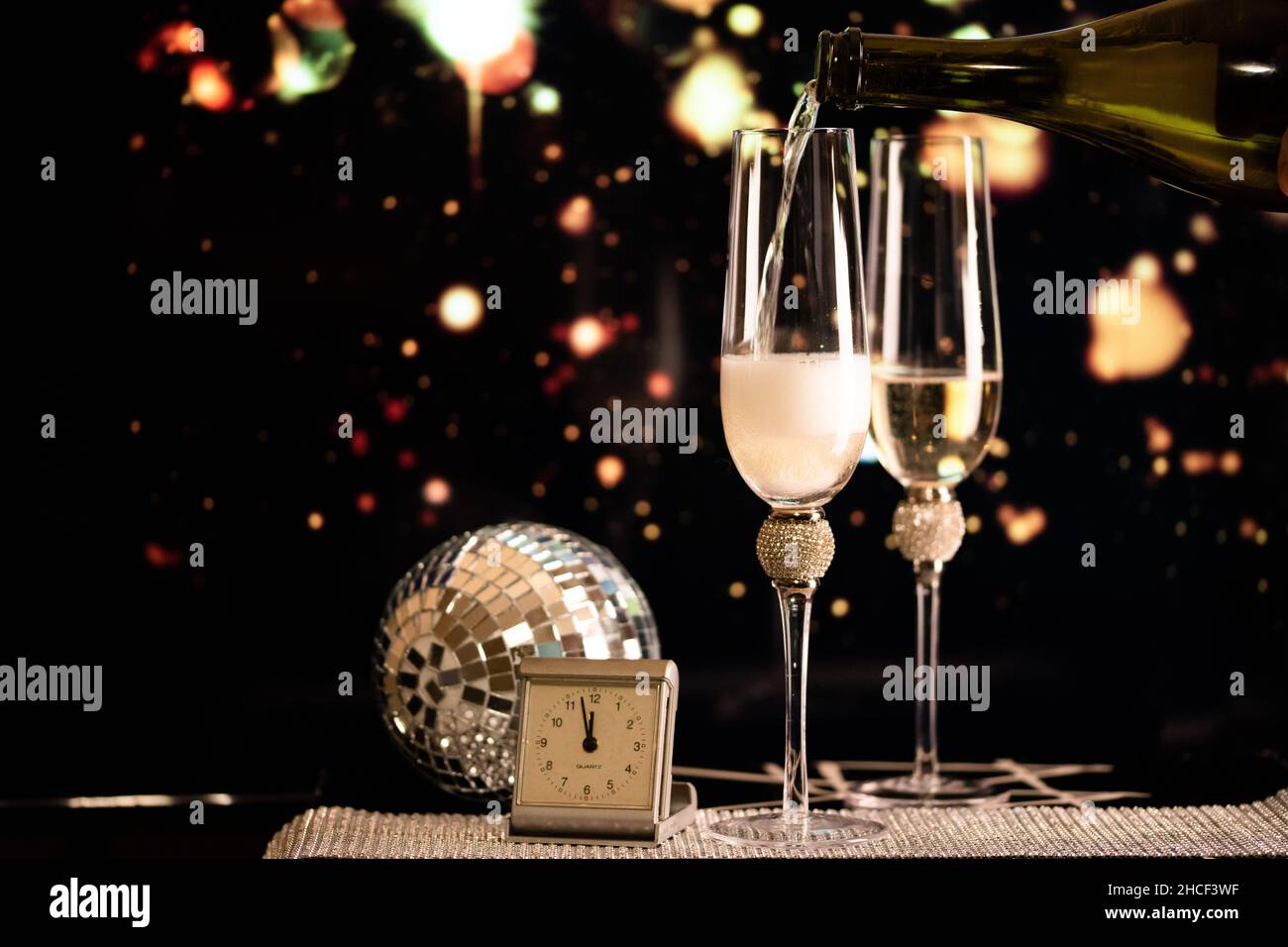 happy New Year champagne glasses and fireworks celebration background ...