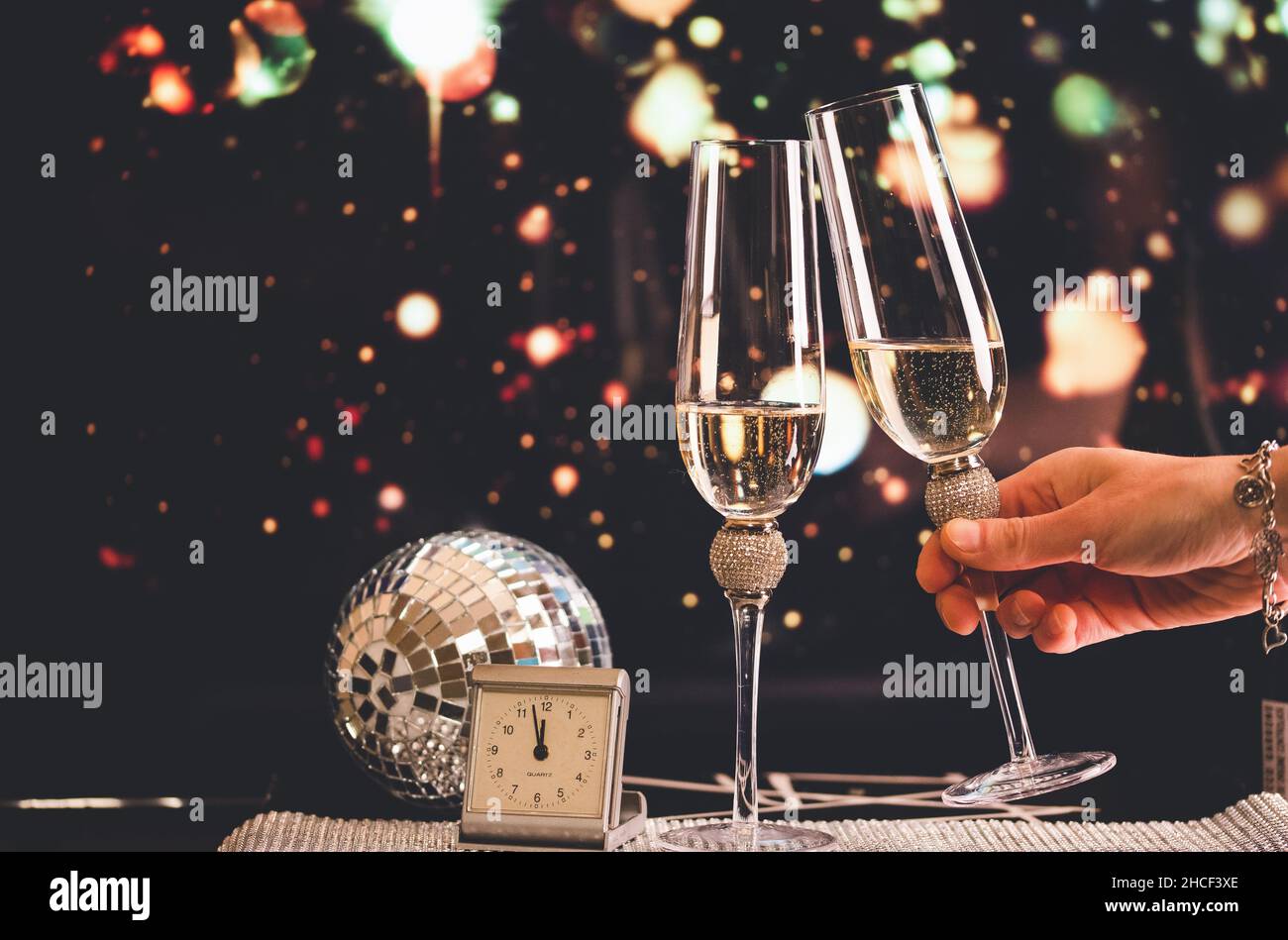 happy New Year champagne glasses and fireworks celebration background ...