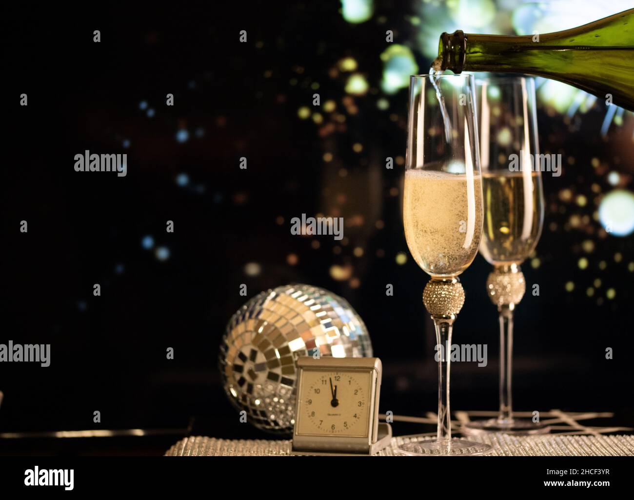 happy New Year champagne glasses and fireworks celebration background ...