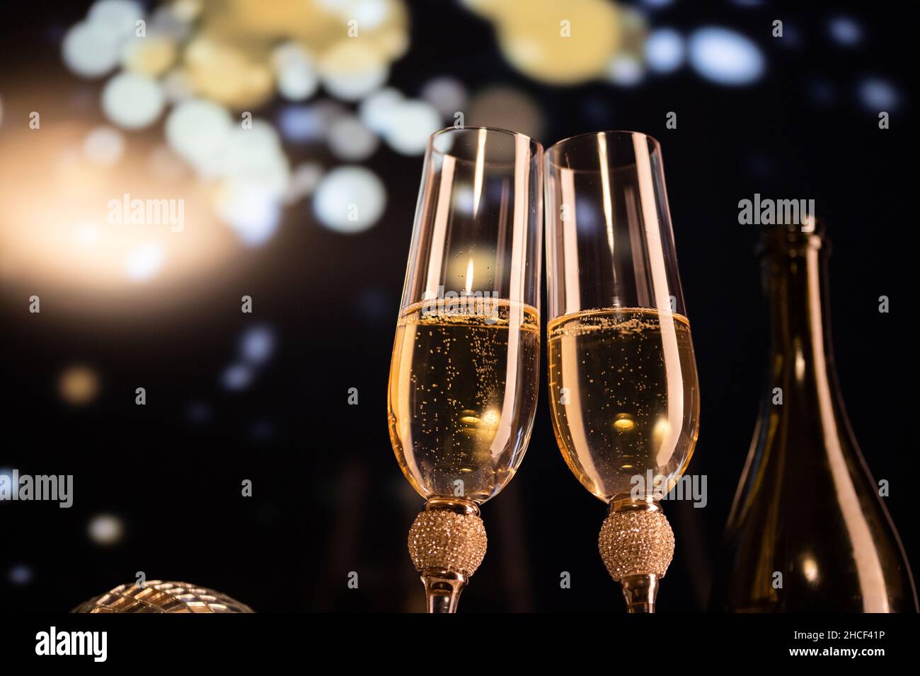 happy New Year champagne glasses and fireworks celebration background ...