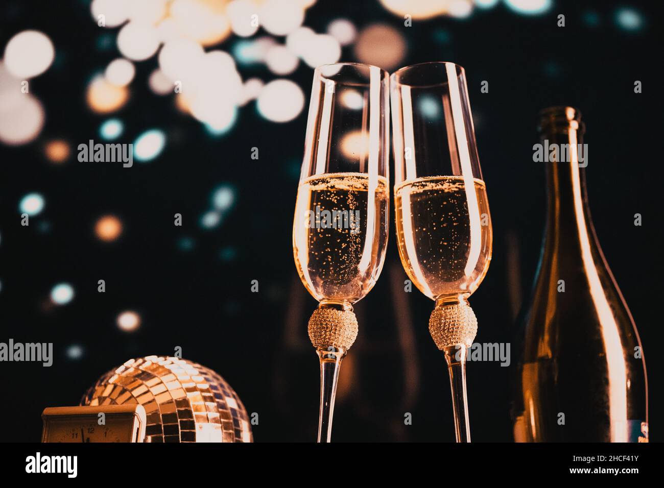 happy New Year champagne glasses and fireworks celebration background ...