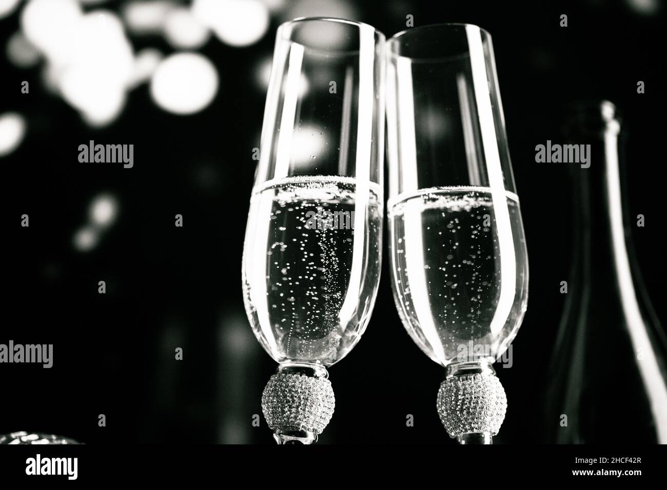 happy New Year champagne glasses and fireworks celebration background ...