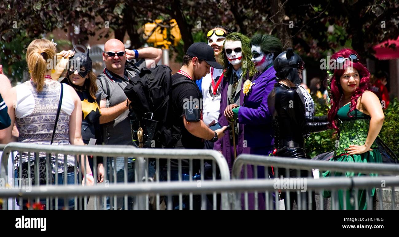 Crowd of cosplayers and people outside a con Stock Photo