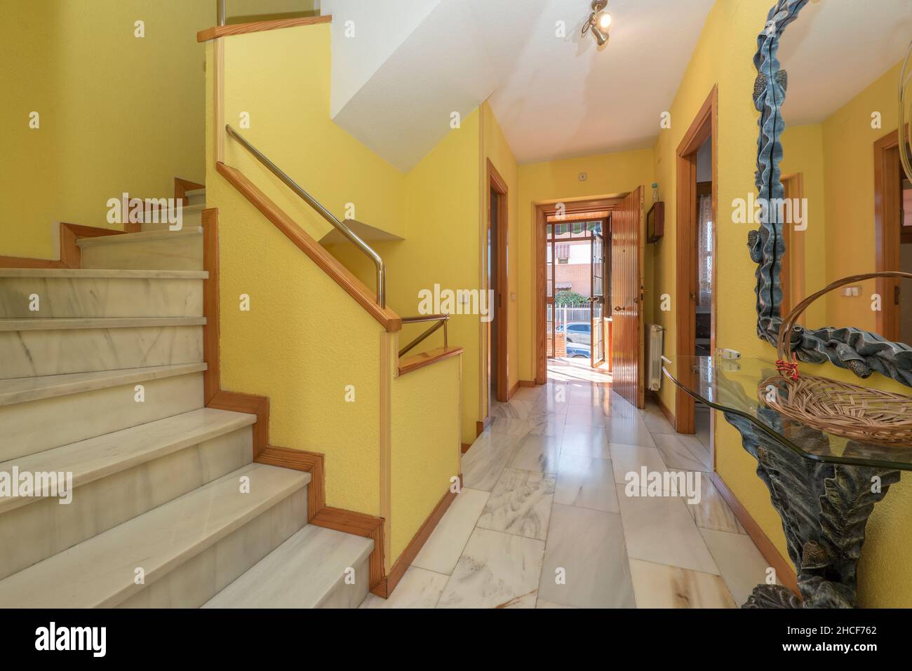 Distributor of multi-storey villa with white marble floors and stairs Stock Photo