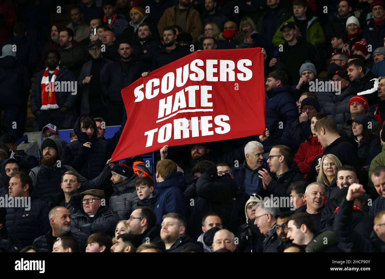 Leicester, England, 28th December 2021.  Liverpool fans with banner claiming “Scousers Hate Tories” during the Premier League match at the King Power Stadium, Leicester. Picture credit should read: Darren Staples / Sportimage Credit: Sportimage/Alamy Live News Stock Photo