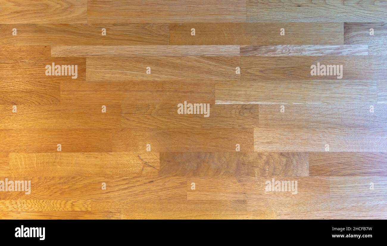 Wood parquet texture, Oak laminate wooden floor background. Natural color house interior flooring, hardwood board Stock Photo