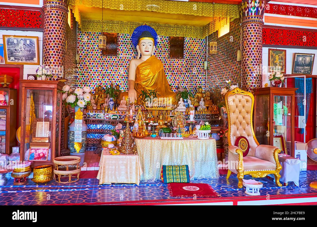 CHIANG MAI, THAILAND - MAY 4, 2019: The altar of the shrine of Wat Sai Moon Myanmar temple, decorated with mirror mosaic patterns, Buddha Image, pilla Stock Photo