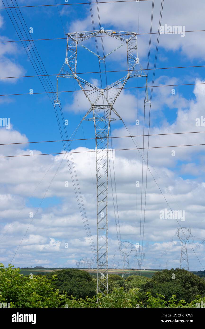 A power transmission high voltage tower in countryside isolated on ...