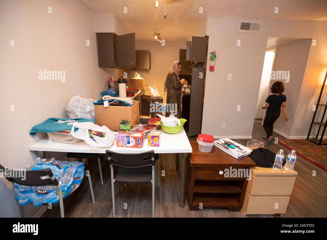 Austin Texas USA, October 2021 Members of an Afghan family move into
