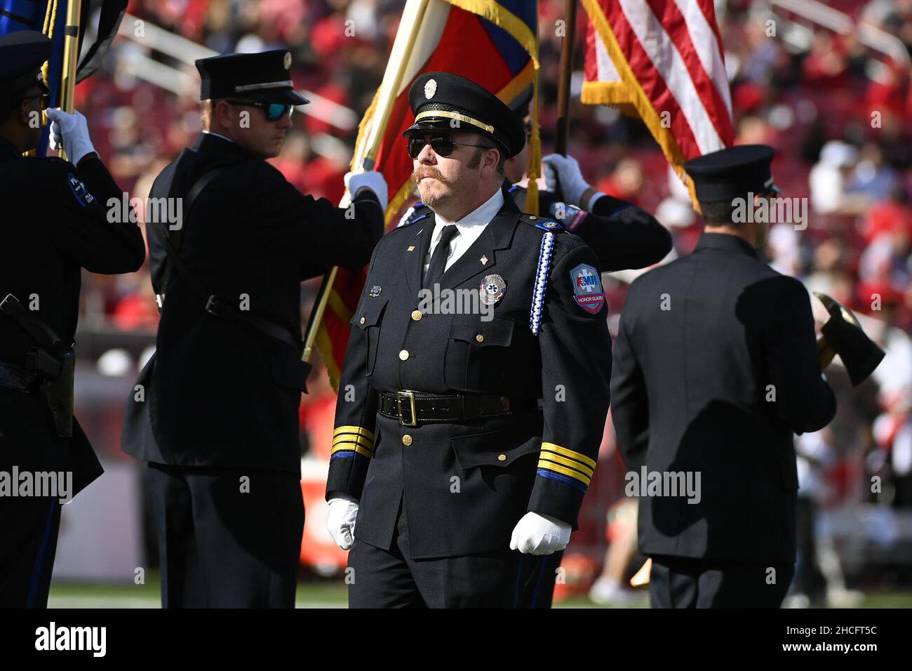Dallas, Texas, USA. December 28, 2021: Honor Guard marching on the field before the ServPro First Responder bowl game between The United States Air Force Academy and the University of Louisville Cardinals at Gerald J. Ford Stadium in Dallas, TX. Air Force leads the first half against Louisville, 28-14. Patrick Green/CSM Credit: Cal Sport Media/Alamy Live News Stock Photo
