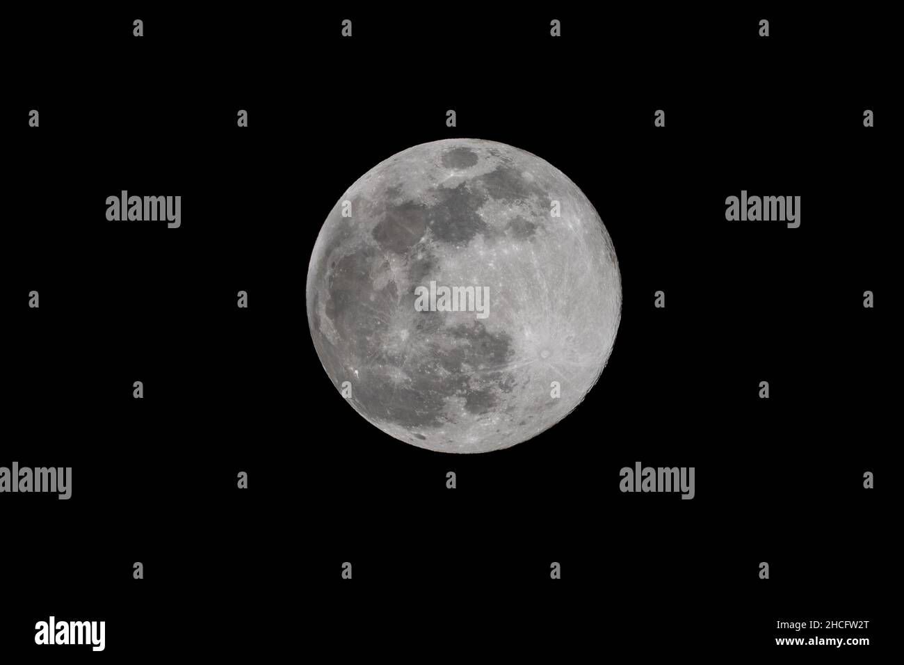 Full moon through a telescope Stock Photo Alamy