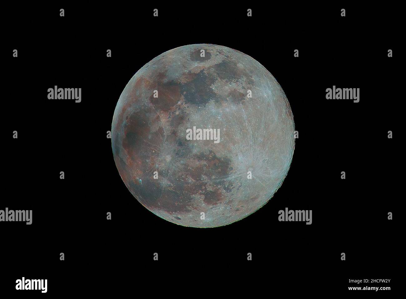 Full moon through a telescope Stock Photo Alamy