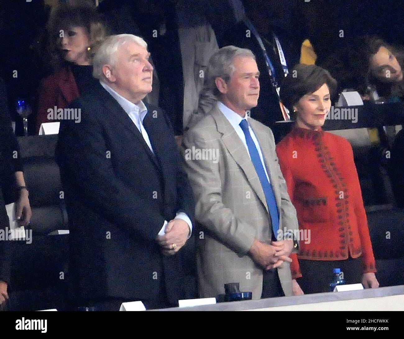 Arlington, USA. 06th Feb, 2011. John Madden (left) sits with former President George W. Bush and Laura Bush at Super Bowl XLV where the Green Bay Packers face the Pittsburgh Steelers at Cowboys Stadium in Arlington, Texas, Sunday, February 6, 2011. (Photo by Max Faulkner/Fort Worth Star-Telegram/MCT/Sipa USA) Credit: Sipa USA/Alamy Live News Stock Photo