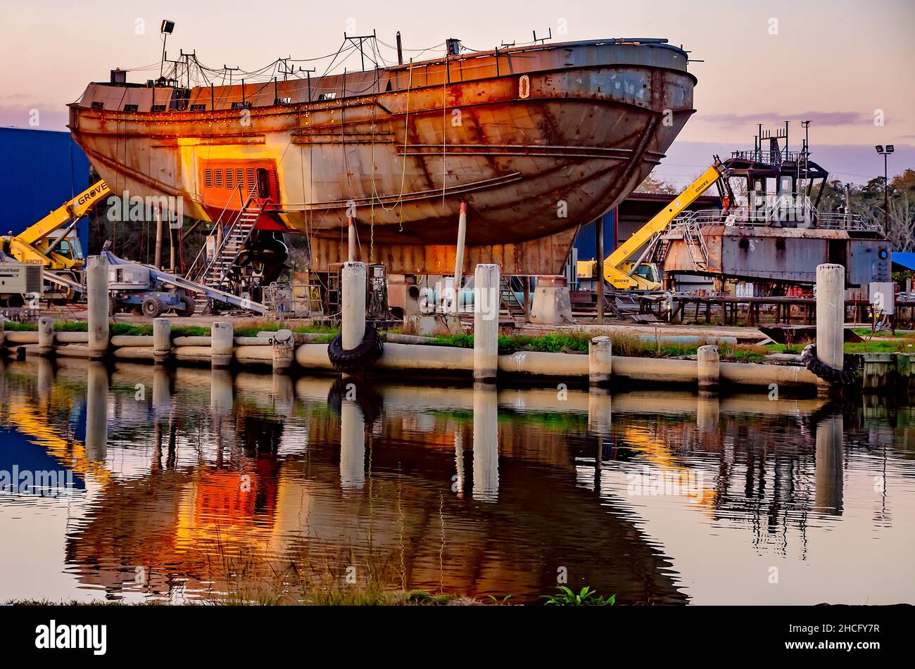 A boat sits in dry dock for repairs, Dec. 27, 2021, in Bayou La Batre, Alabama. Bayou La Batre is known as the seafood capital of Alabama. Stock Photo
