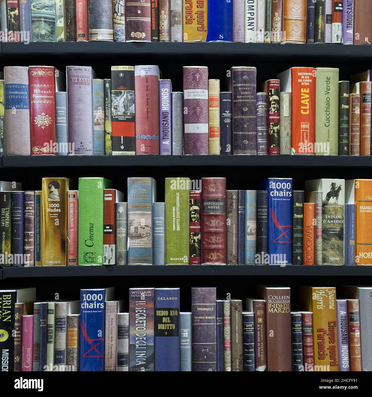Vertical shot of the bookcase column at the international book fair in Torino, Italy Stock Photo
