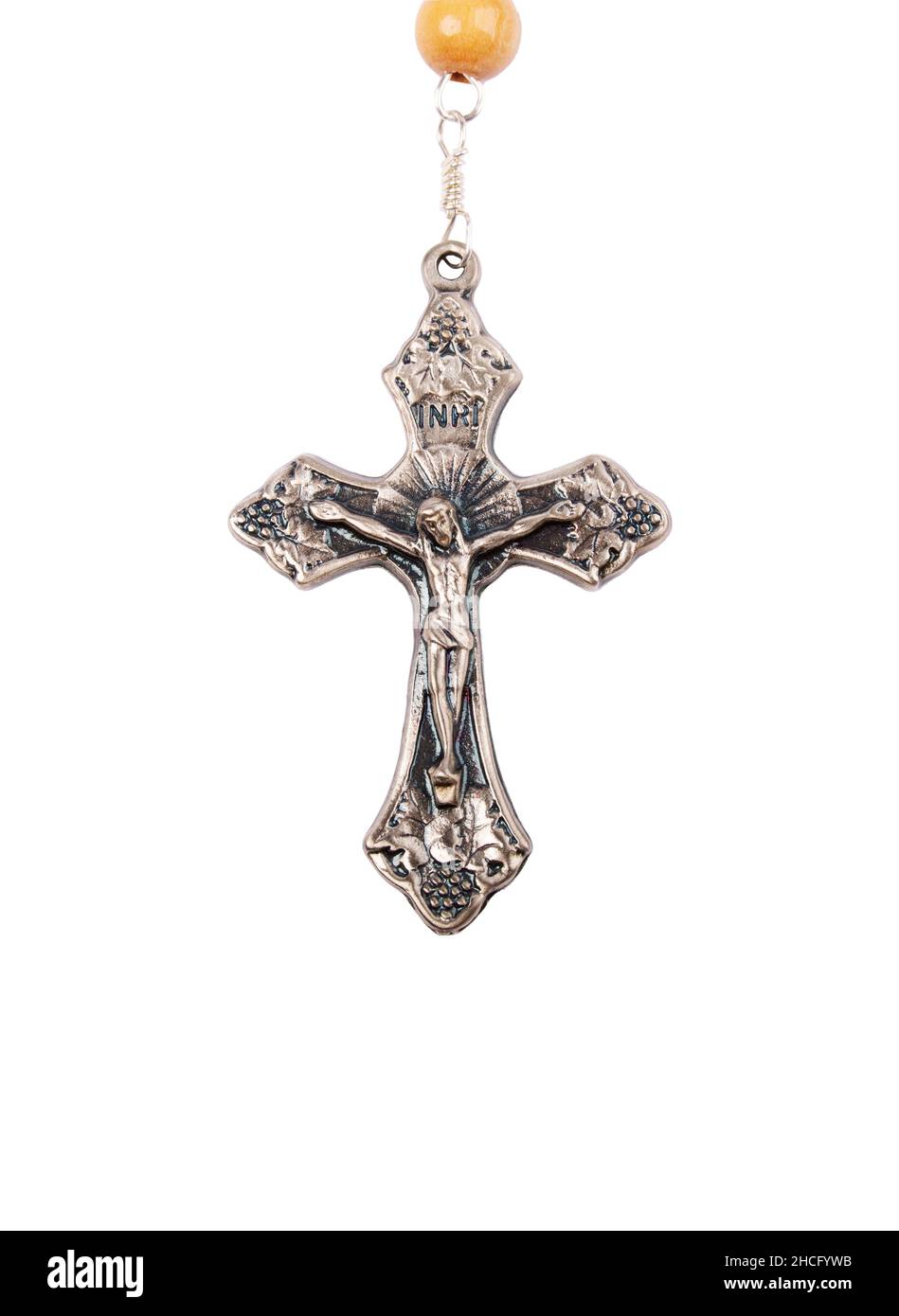 Silver crucifix close-up isolated on white background Stock Photo