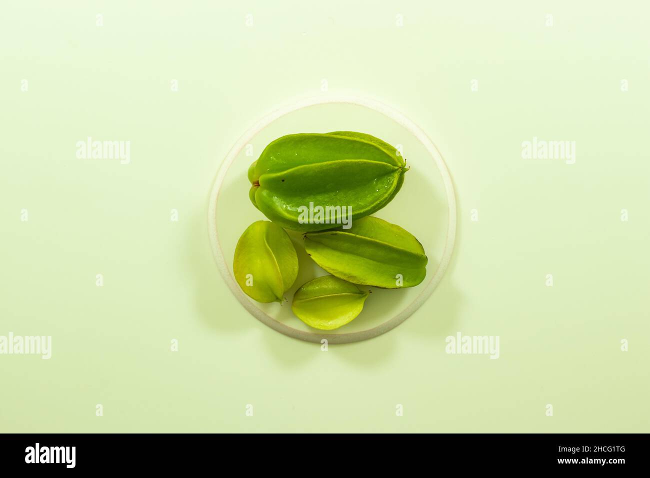 Carambola fruit when ripe or star fruit with tinges of light green Stock Photo