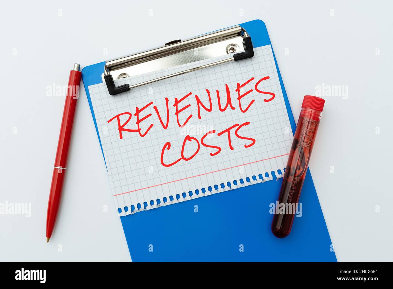 Text showing inspiration Revenues Costs. Word Written on Total amount of money in Manufacturing and Delivery a product Preparing And Writing Stock Photo