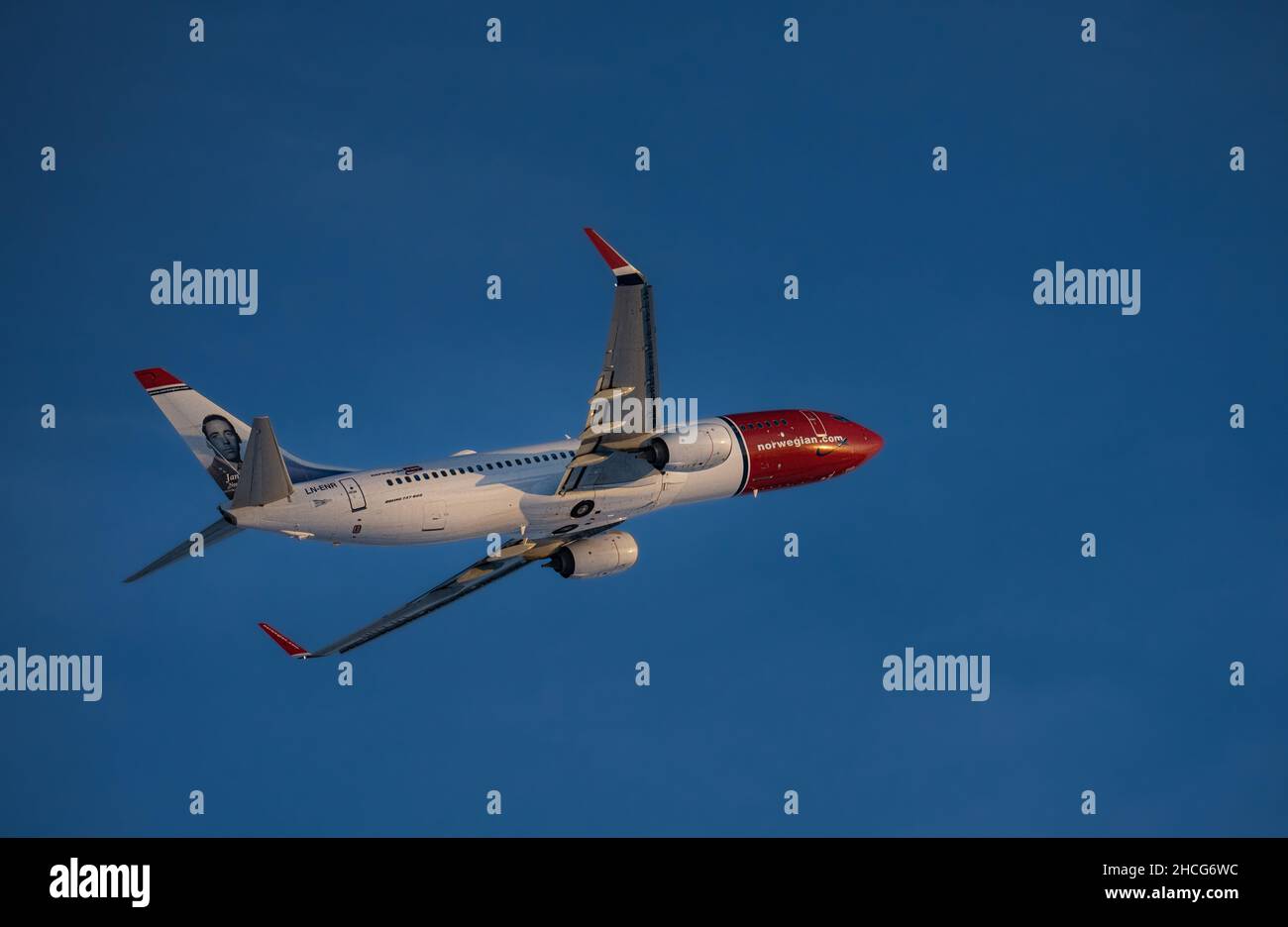 27-12-2021 Latvia Riga modern passenger plane lands at airport. Stock Photo