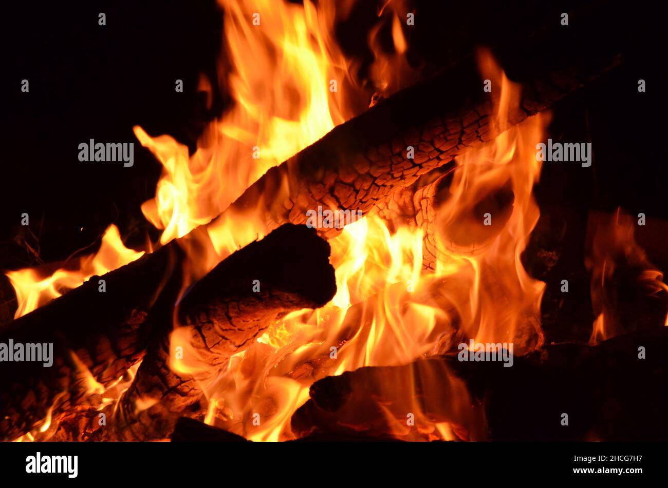 logs burning on an open fire Stock Photo Alamy