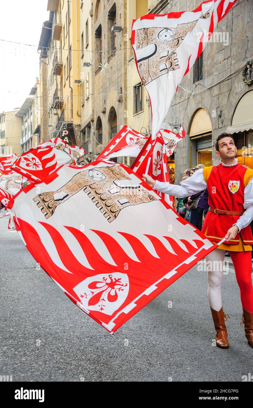 Florence, Italy - January 6, 2013: Flag throwing and waving parade as part of Epiphany day, with a grand procession in medieval costumes. Stock Photo