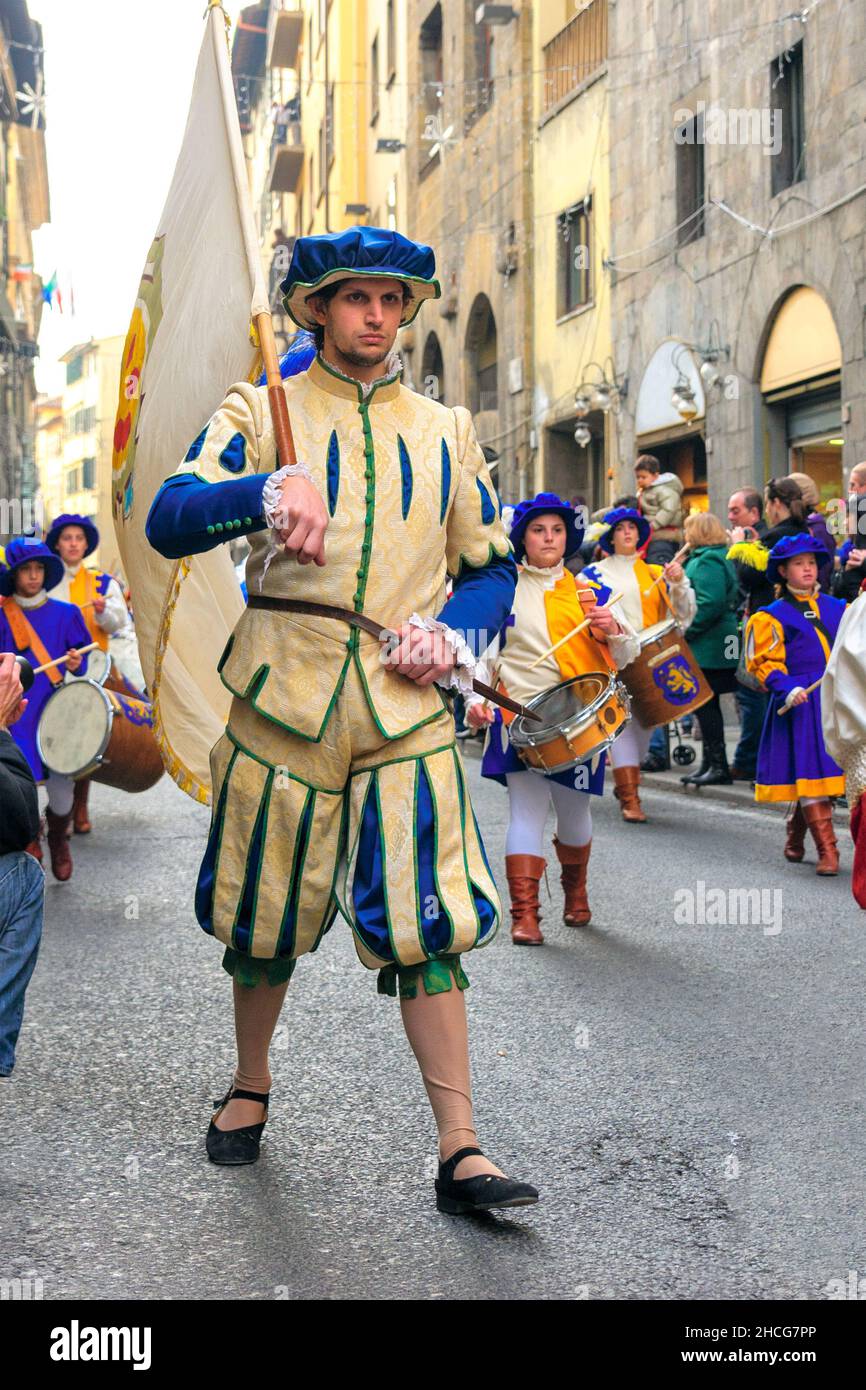 Florence, Italy - January 6, 2013: Flag throwing and waving parade as part of Epiphany day, with a grand procession in medieval costumes. Stock Photo