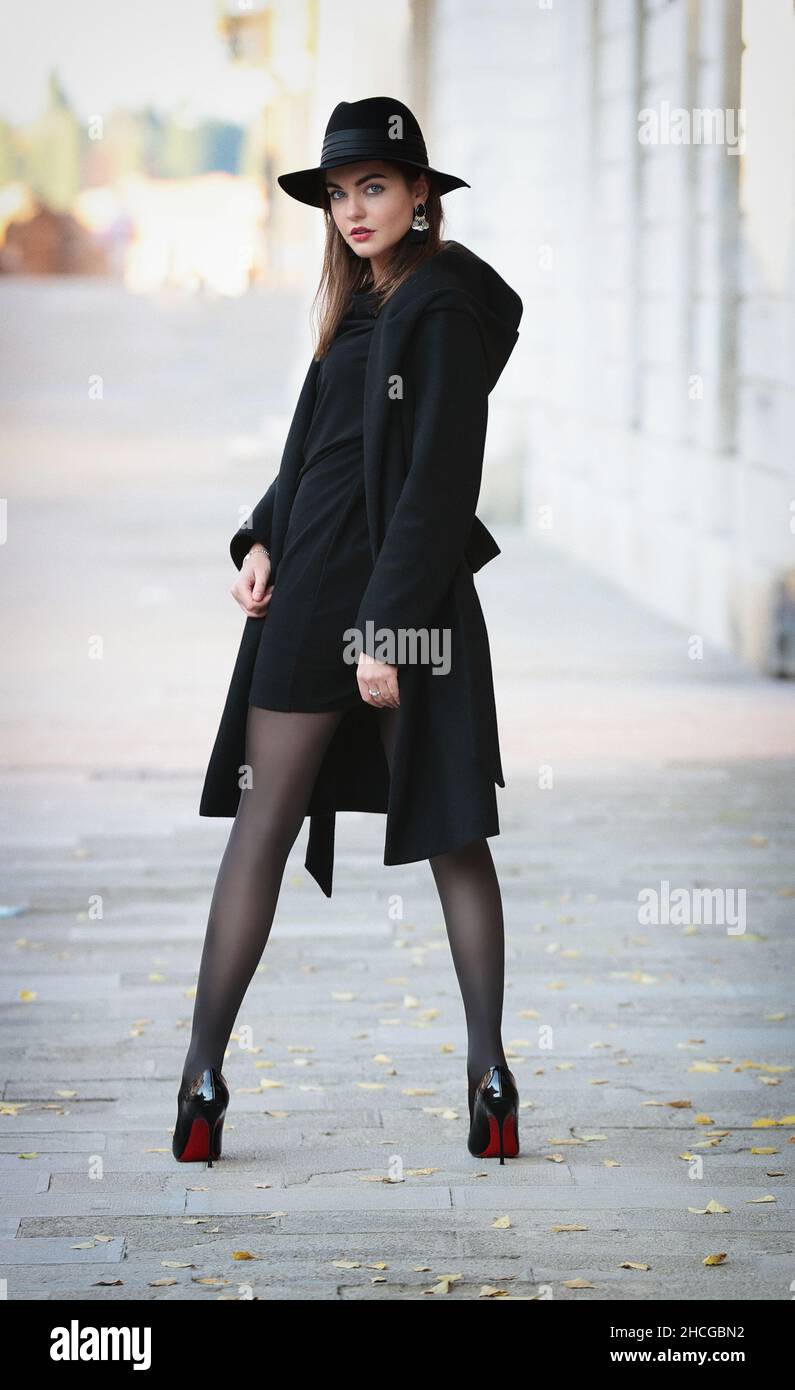 A girl is wearing a pair of black pantyhose Stock Photo Alamy