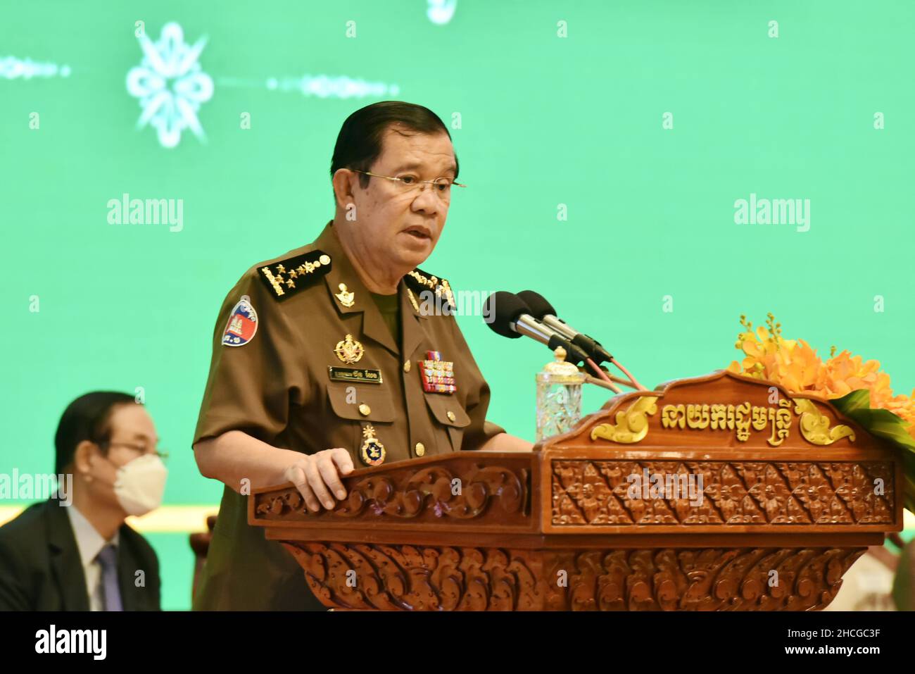Phnom Penh. 29th Dec, 2021. Cambodian Prime Minister Samdech Techo Hun Sen speaks during the inauguration ceremony of the new office building of the Ministry of National Defense in Phnom Penh, Cambodia on Dec. 29, 2021. Cambodia on Wednesday inaugurated the new office building of the Ministry of National Defense in central area of the capital Phnom Penh. Credit: Ly Lay/Xinhua/Alamy Live News Stock Photo