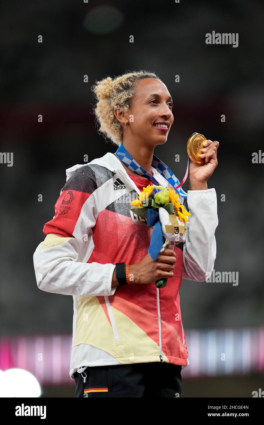 Malaika Mihambo on the podium with the gold medal at the Tokyo 2020 ...