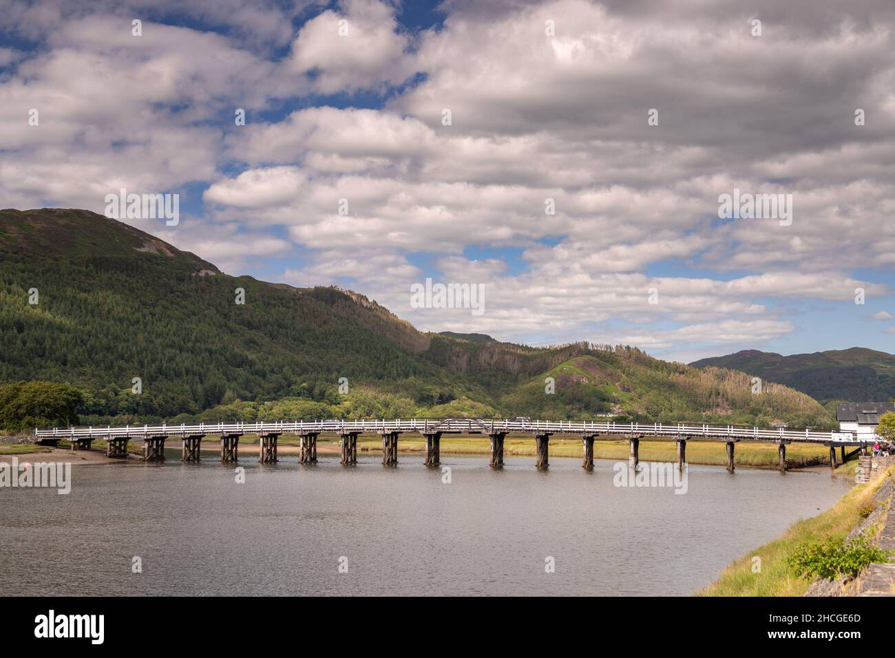 Wooden toll bridge at Penmaenpool on the Mawddach estuary, Wales Stock Photo