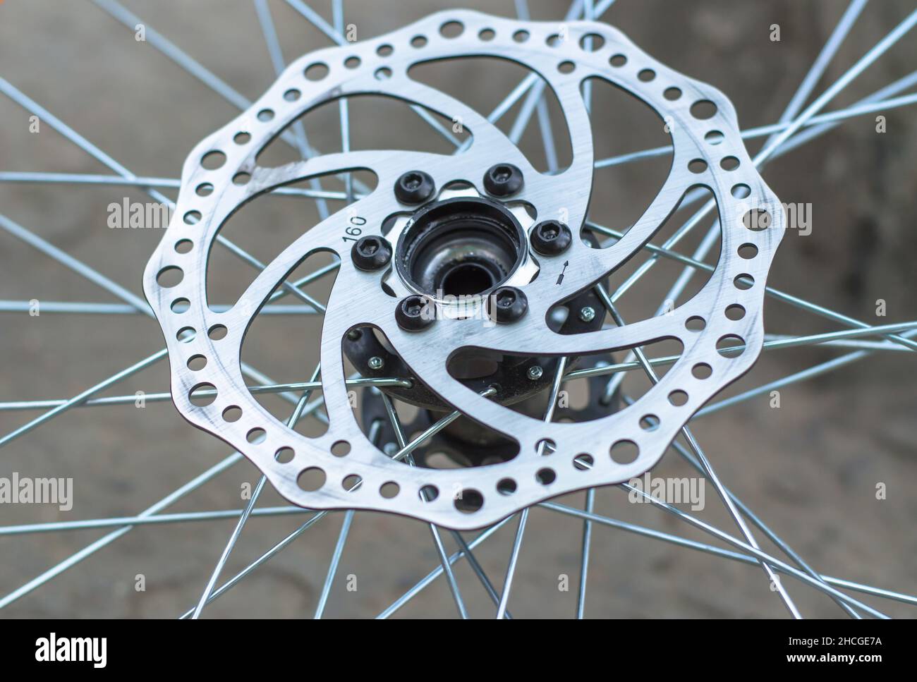Disc brake of a front bicycle wheel closeup. Bicycle repair Stock Photo Alamy