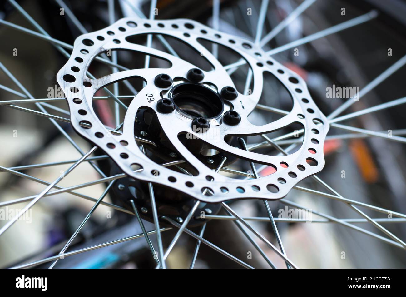 Disc brake of a front bicycle wheel closeup. Bicycle repair Stock Photo Alamy