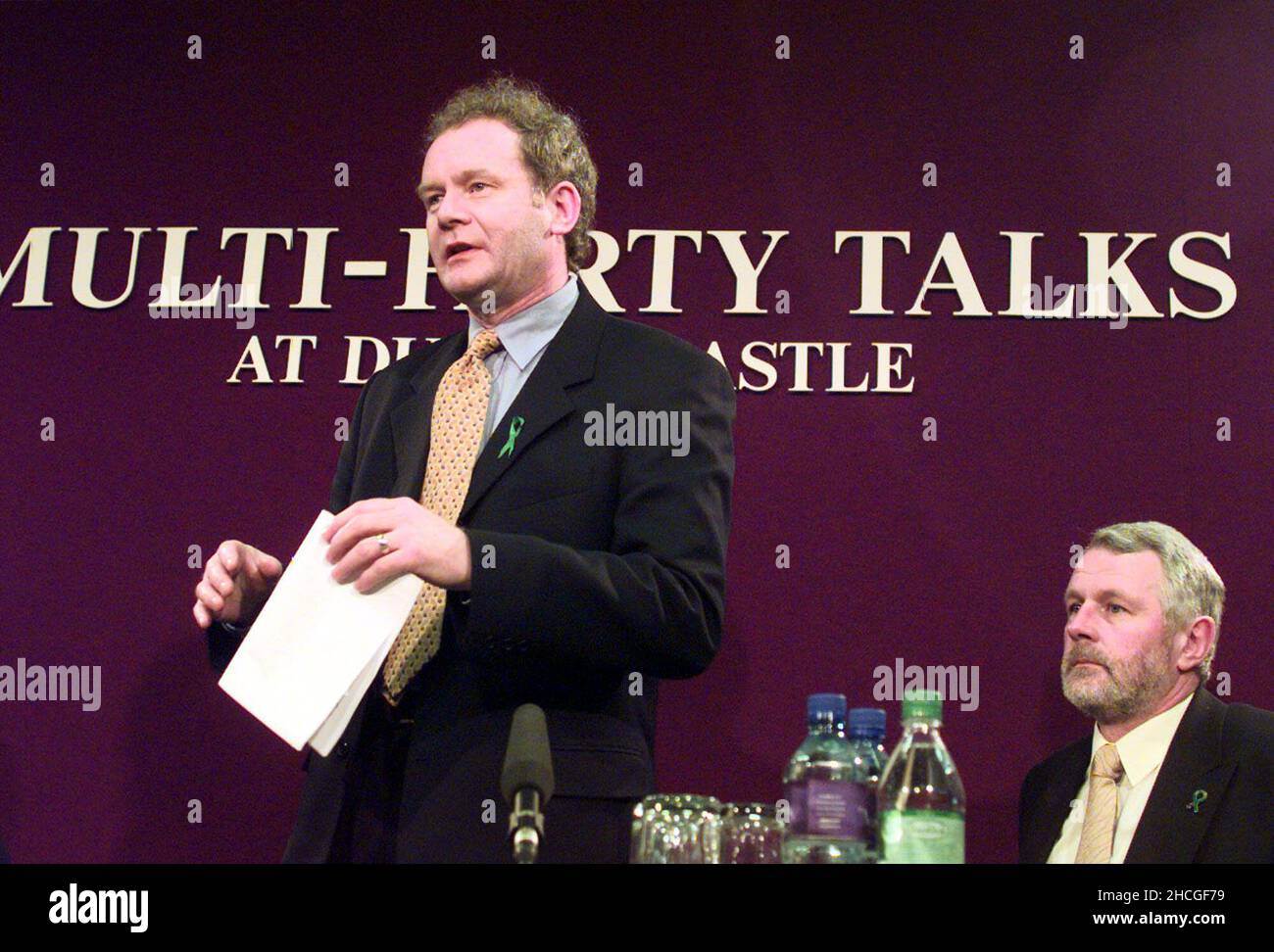 File photo dated 17/02/98 of then Sinn Fein chief negotiator Martin McGuinness after reading a statement at Dublin Castle asking for an adjournment of the Northern Ireland peace talks to seek legal advice so Sinn Fein could stay at the negotiating table. Memos directed staff on how they were to engage with Sinn Fein after the party committed itself to the Mitchell principles, according to newly released documents from the National Archives. Issue date: Wednesday December 29, 2021. Stock Photo