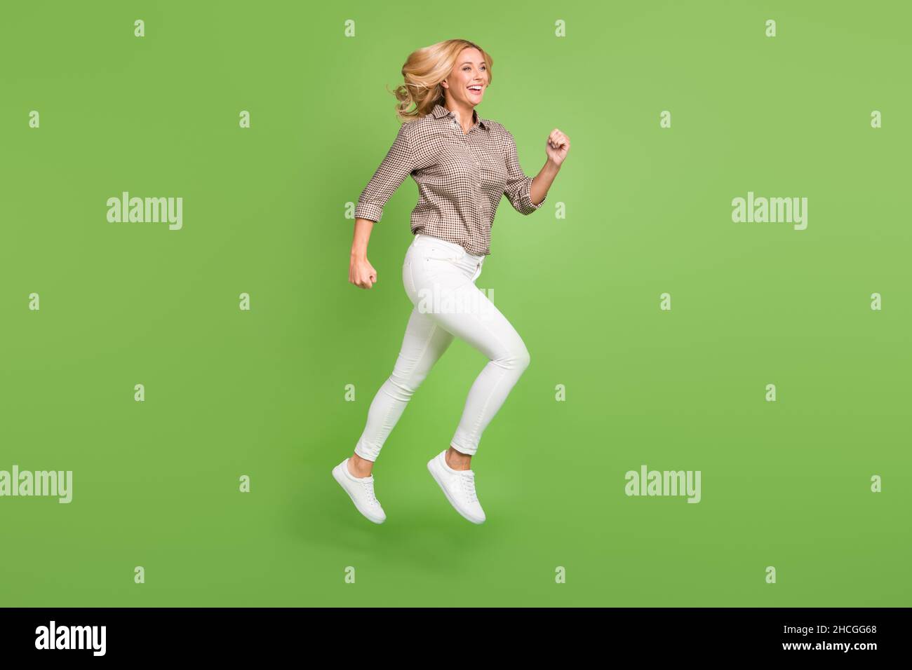 Full length body size side profile photo of jumping woman running on