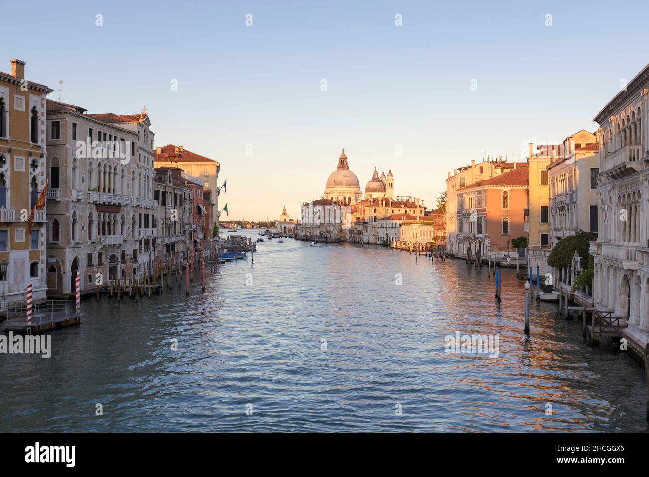 View of Venice with the Grand Canal and Basilica Santa Maria della Salute at dusk, Venice, Italy Stock Photo
