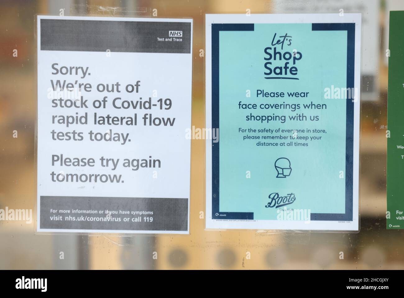 An out of stock lateral flow test sign on the window of a Boots