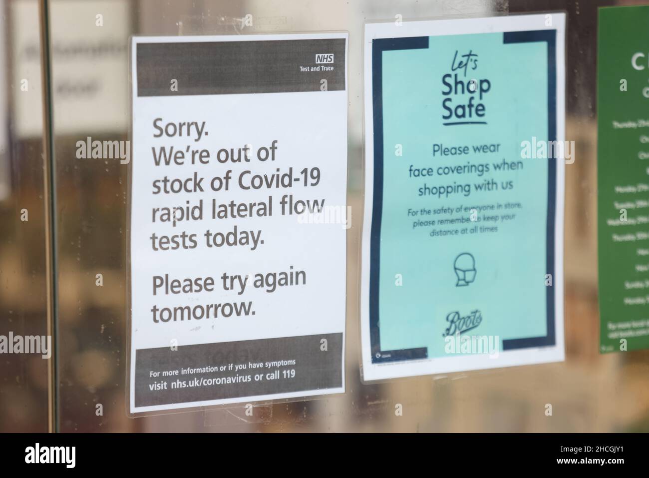 An out of stock lateral flow test sign on the window of a Boots
