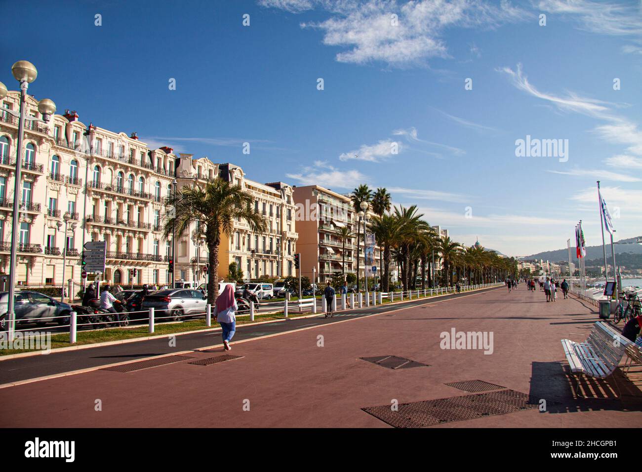 Promenade des Anglais in Nice, French Riviera, with people strolling. Nice France - September 29, 2021. Stock Photo