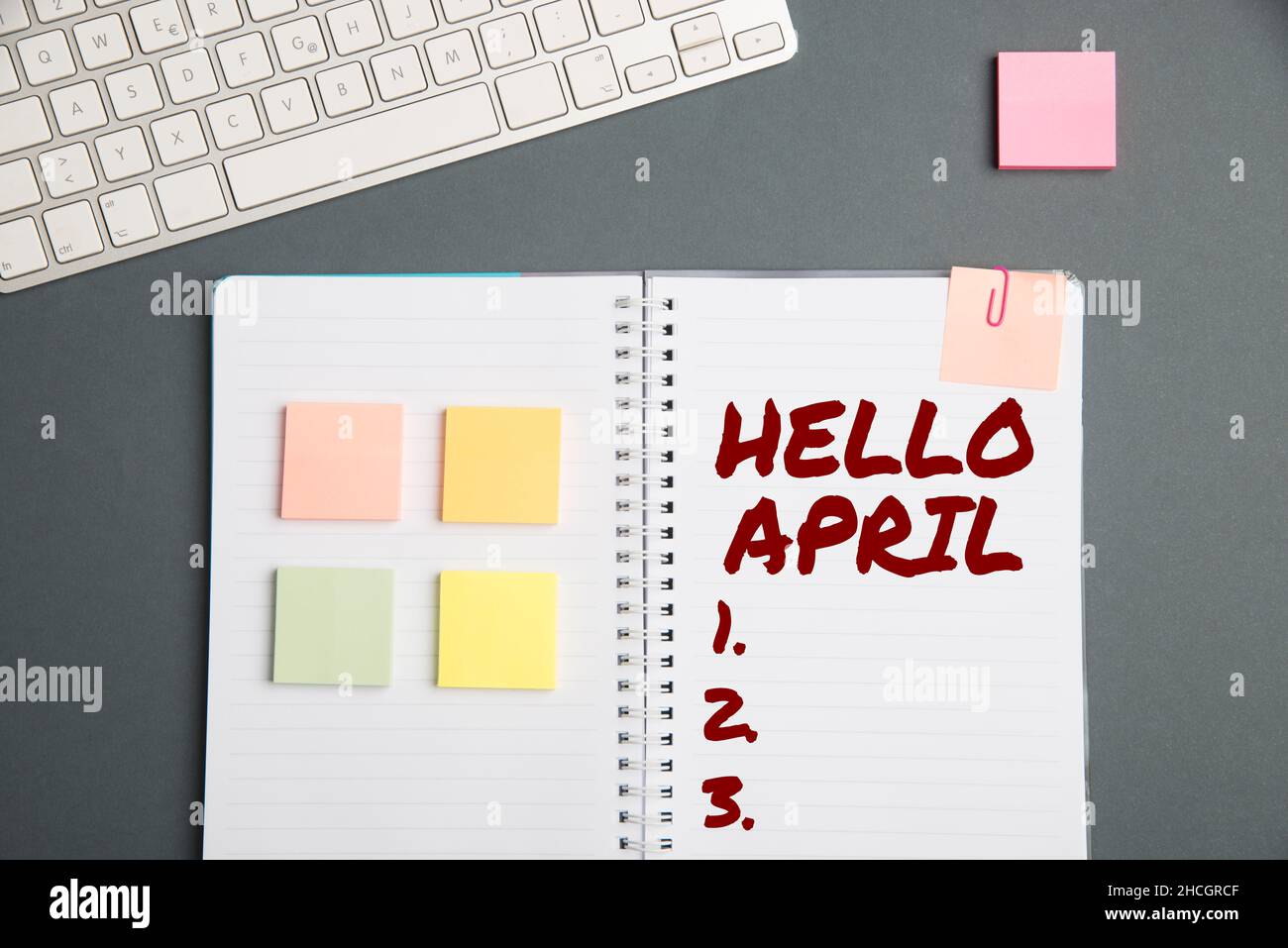 Notebook April Sign displaying Hello April. Internet Concept a greeting expression ...