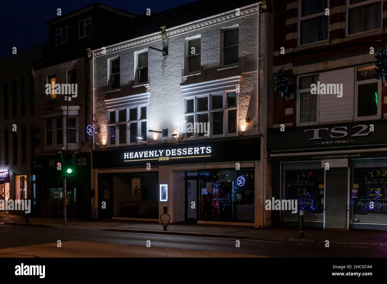 Shop fronts ealry morning on Wellingborough road, Northampton, England, UK Stock Photo Alamy